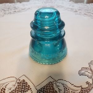 Antique telephone pole insulator. Dark aqua glass.